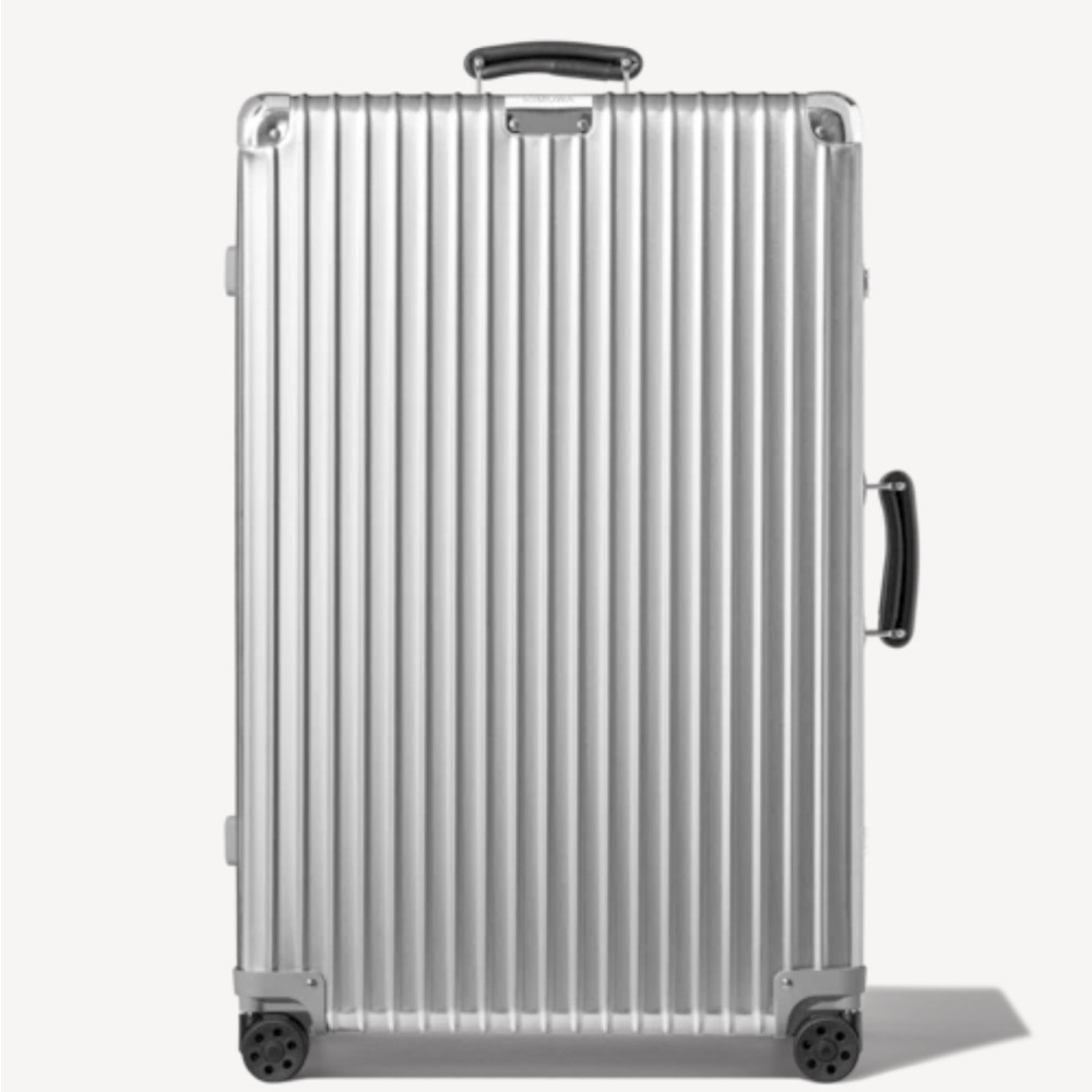 Rimowa Aluminum suitcase.